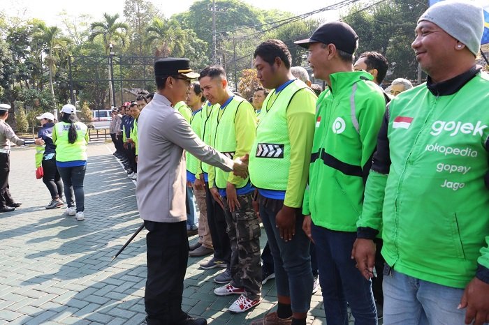 Ciptakan Tertib Lalu Lintas, Polres Malang Rangkul Pengemudi Ojol dan Relawan